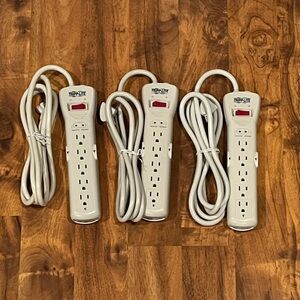 Three (3): Tripp Lite - 7 Outlet Surge Protector Power Strips - Model: SUPER7